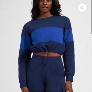 Buffbunny Cadi crop long sleeve, color block blue, size XS, NWOT